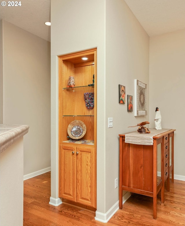 hallway featuring light hardwood / wood-style floors