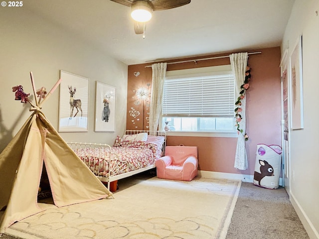 carpeted bedroom with ceiling fan