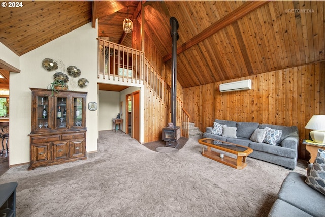 carpeted living room with high vaulted ceiling, wood walls, wood ceiling, beamed ceiling, and a wall unit AC