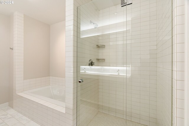 bathroom featuring separate shower and tub and tile patterned floors