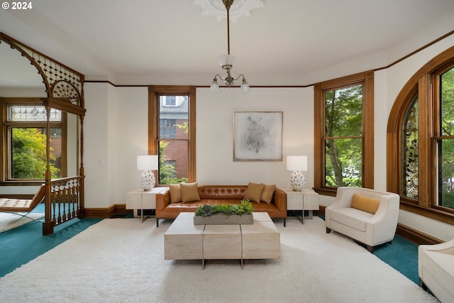 726 NW 22nd Ave, Portland, OR 97210 - living room with baseboards and a chandelier