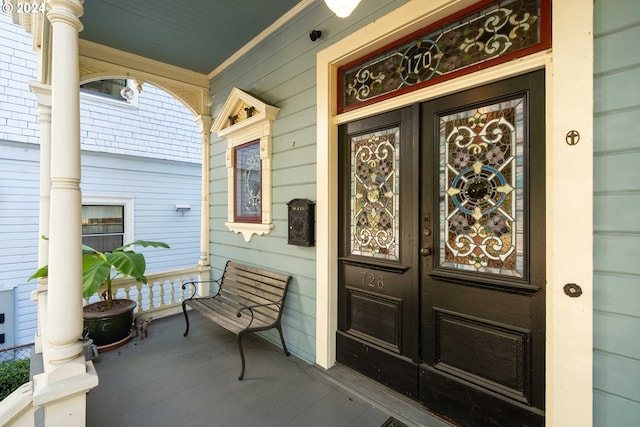 property entrance with a porch