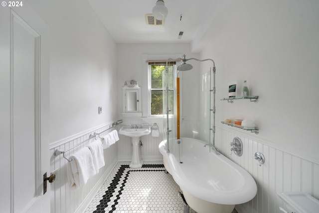 726 NW 22nd Ave, Portland, OR 97210 - bathroom featuring visible vents, a stall shower, wainscoting, and a freestanding bath