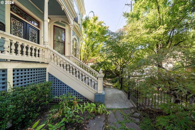 726 NW 22nd Ave, Portland, OR 97210 - view of side of home featuring a porch and stairs
