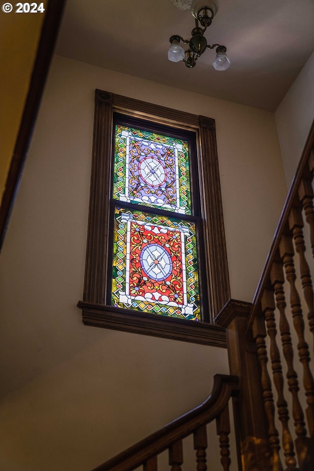 interior details featuring a notable chandelier