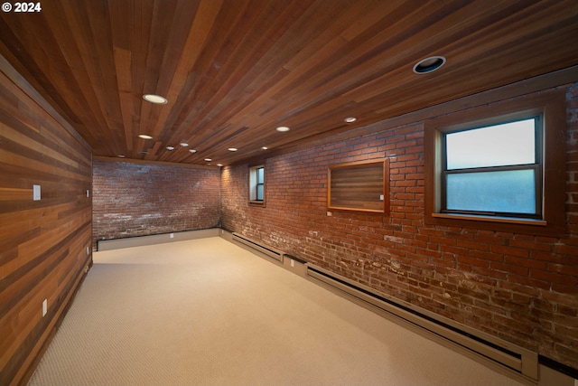 basement featuring carpet floors, wood ceiling, and brick wall