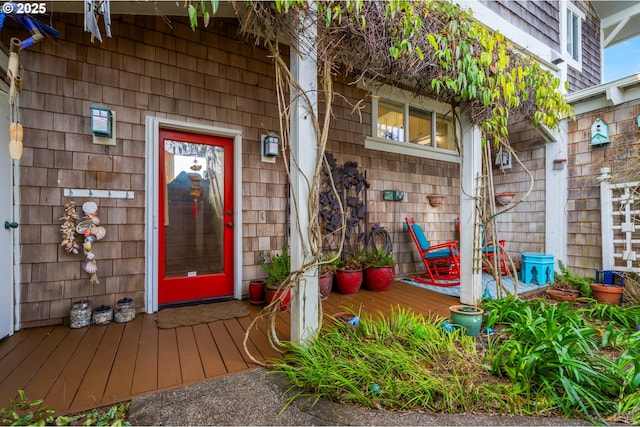 entrance to property with a deck