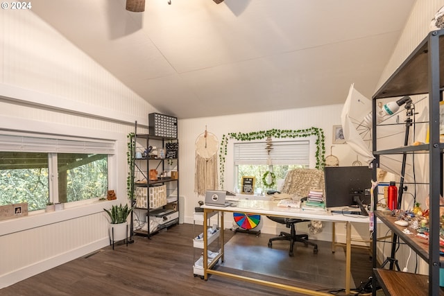 home office featuring dark hardwood / wood-style floors, a wealth of natural light, lofted ceiling, and ceiling fan