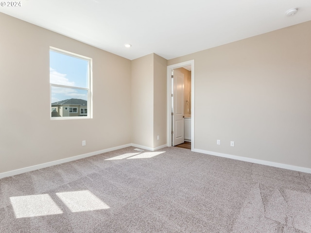 view of carpeted spare room