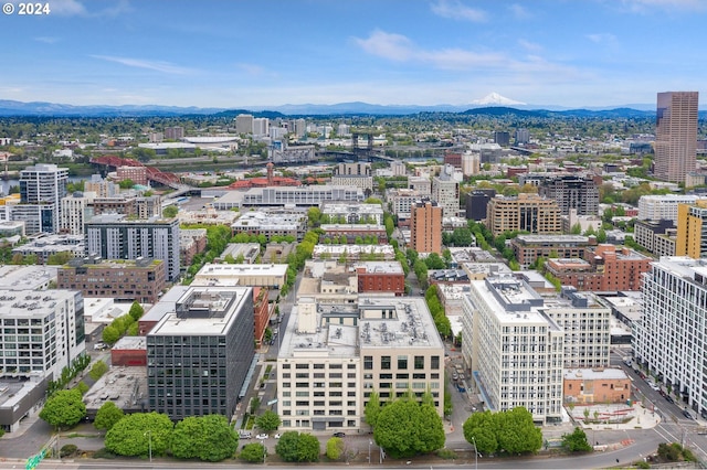 bird's eye view with a view of city and a mountain view