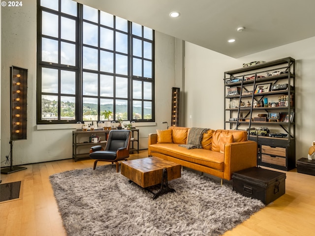 sitting room featuring recessed lighting and wood finished floors