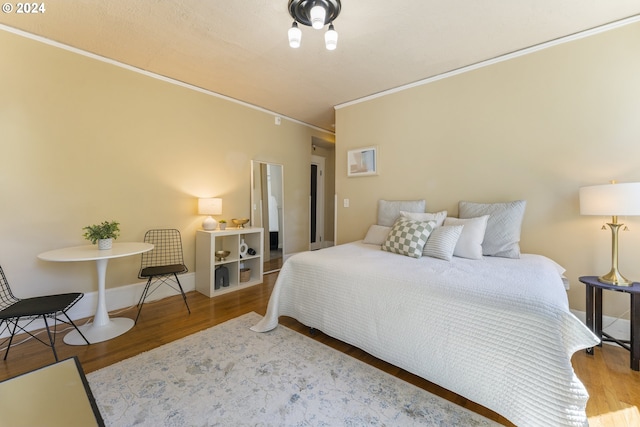 bedroom featuring hardwood / wood-style flooring