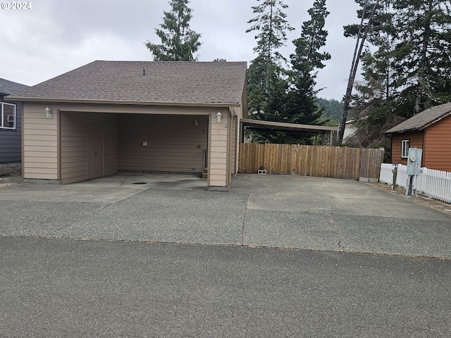 garage with a carport