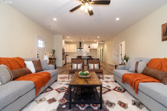 6018 Little Woahink Dr, Florence, OR 97439 - living area featuring ceiling fan, recessed lighting, and light wood finished floors