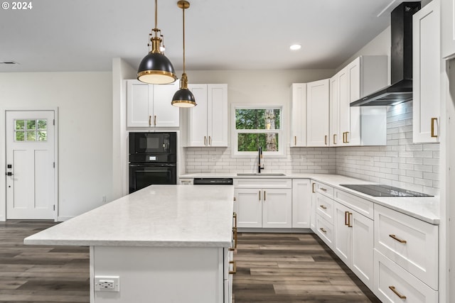 6018 Little Woahink Dr, Florence, OR 97439 - kitchen with wall chimney range hood, black appliances, plenty of natural light, dark wood-type flooring, and recessed lighting