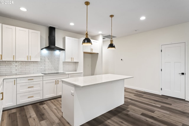 6018 Little Woahink Dr, Florence, OR 97439 - kitchen featuring wall chimney exhaust hood, black electric stovetop, white cabinets, backsplash, and dark wood-type flooring