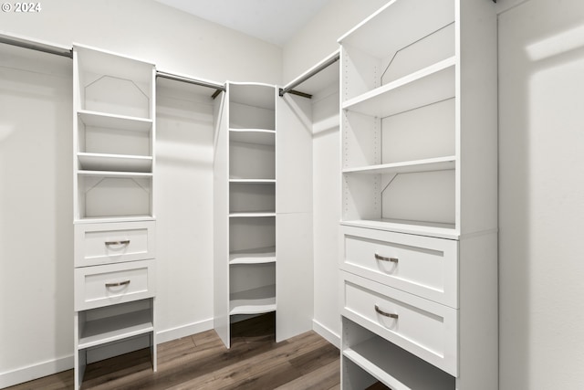 6018 Little Woahink Dr, Florence, OR 97439 - walk in closet with dark wood finished floors