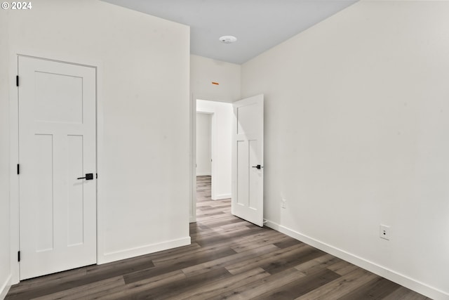 6018 Little Woahink Dr, Florence, OR 97439 - unfurnished bedroom with wood finished floors