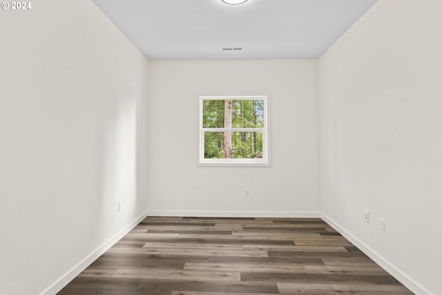 6018 Little Woahink Dr, Florence, OR 97439 - empty room with baseboards and wood finished floors