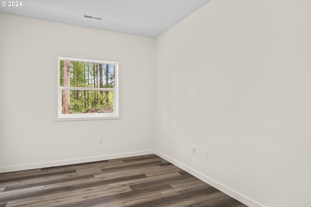 6018 Little Woahink Dr, Florence, OR 97439 - empty room with baseboards and dark wood-style floors