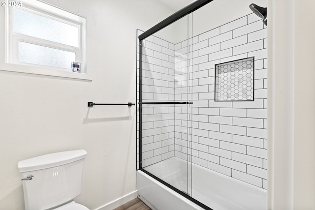 6018 Little Woahink Dr, Florence, OR 97439 - bathroom with toilet and bath / shower combo with glass door