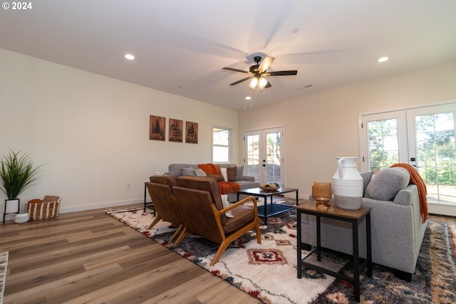 6018 Little Woahink Dr, Florence, OR 97439 - living room with french doors, wood finished floors, a ceiling fan, and recessed lighting