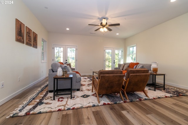 6018 Little Woahink Dr, Florence, OR 97439 - living area with french doors, wood finished floors, a ceiling fan, and recessed lighting