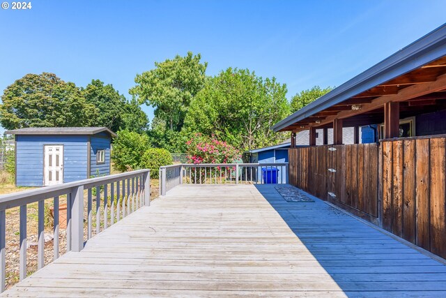 wooden deck with a storage unit