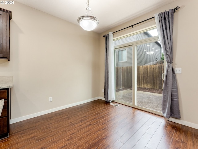 interior space with dark wood-type flooring