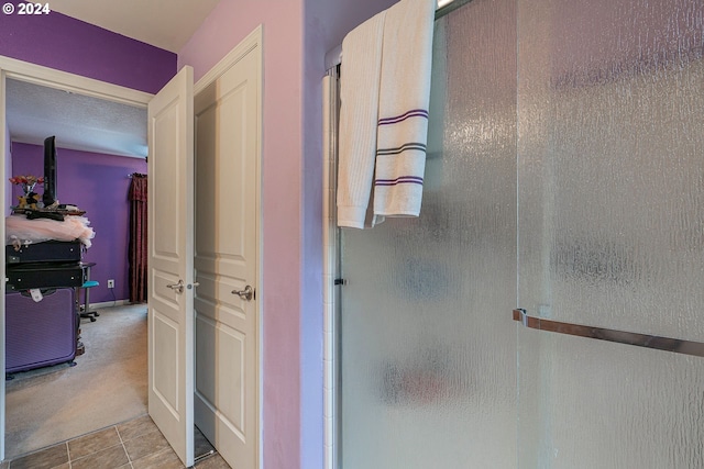 bathroom with tile patterned flooring