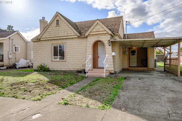 view of front of home with a carport