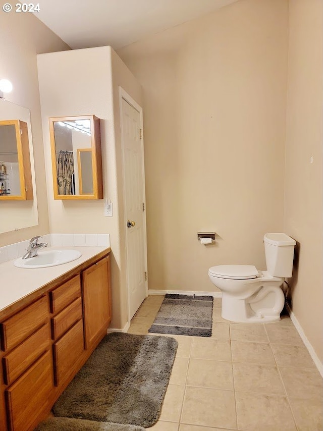 71823 Meadow Loop, Boardman, OR 97818 - bathroom with tile patterned floors, vanity, and toilet