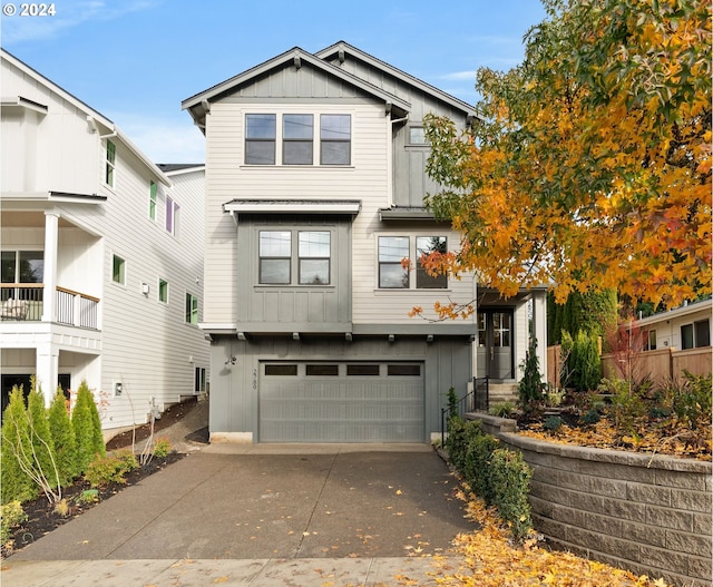 view of front of property with a garage