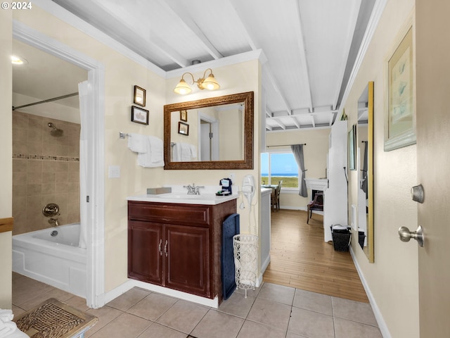 bathroom featuring shower / bath combo with shower curtain, vanity, hardwood / wood-style floors, and crown molding