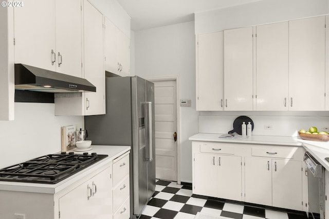 kitchen featuring stainless steel dishwasher, white cabinetry, and gas cooktop