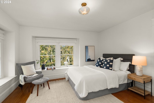 bedroom featuring wood-type flooring