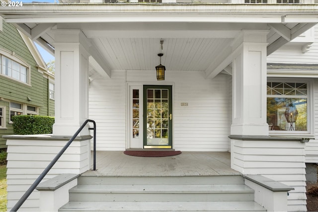 entrance to property with a porch