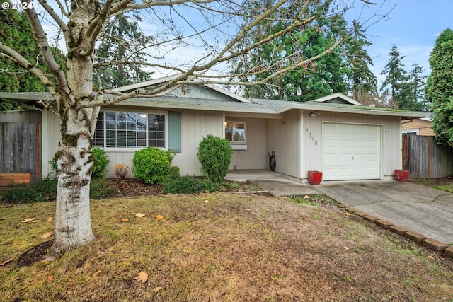 single story home featuring a garage