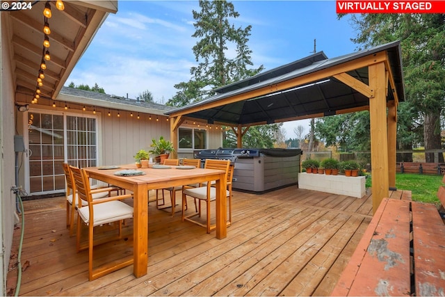 wooden deck with a gazebo