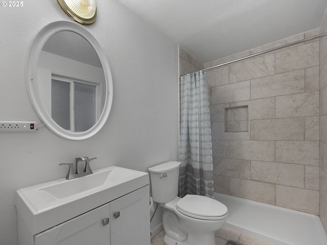 bathroom with a shower with curtain, vanity, a textured ceiling, and toilet