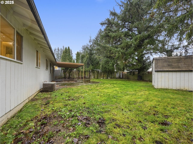 view of yard with central AC