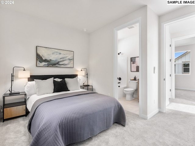 carpeted bedroom featuring connected bathroom