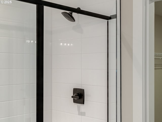 room details featuring a shower with shower door