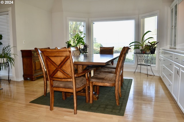 dining area featuring light wood-type flooring