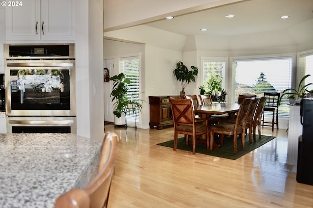 dining room with light hardwood / wood-style floors