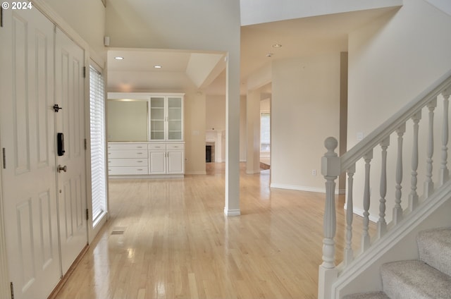 foyer with plenty of natural light and light wood-type flooring