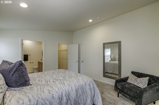 clothes washing area with hookup for a washing machine, hardwood / wood-style floors, and electric dryer hookup