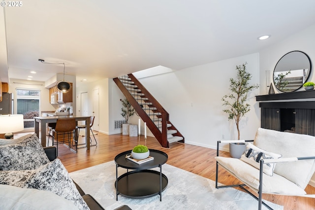 living room featuring light hardwood / wood-style flooring