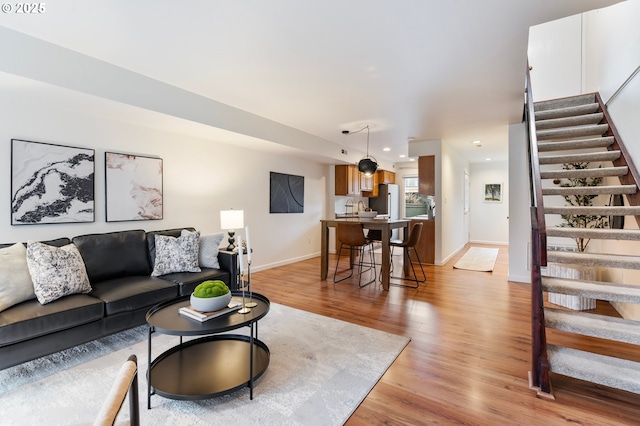 living room featuring light wood-type flooring