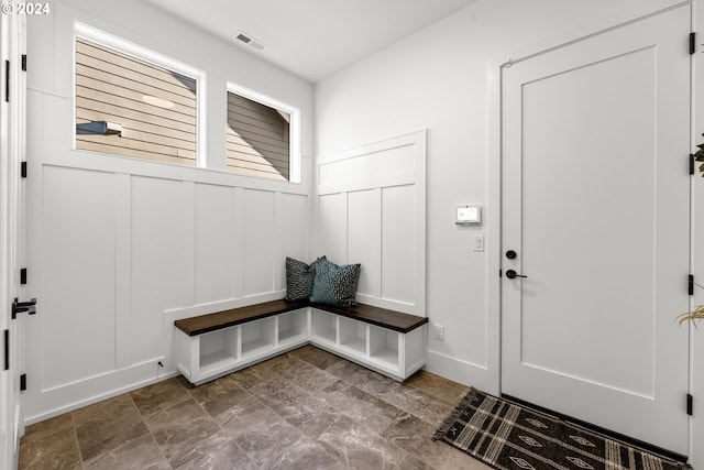 mudroom with tile floors